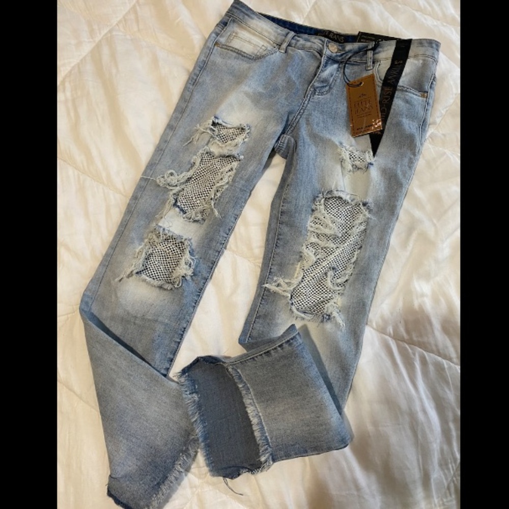 Mid rise ankle distressed  gemmed fishnet jeans